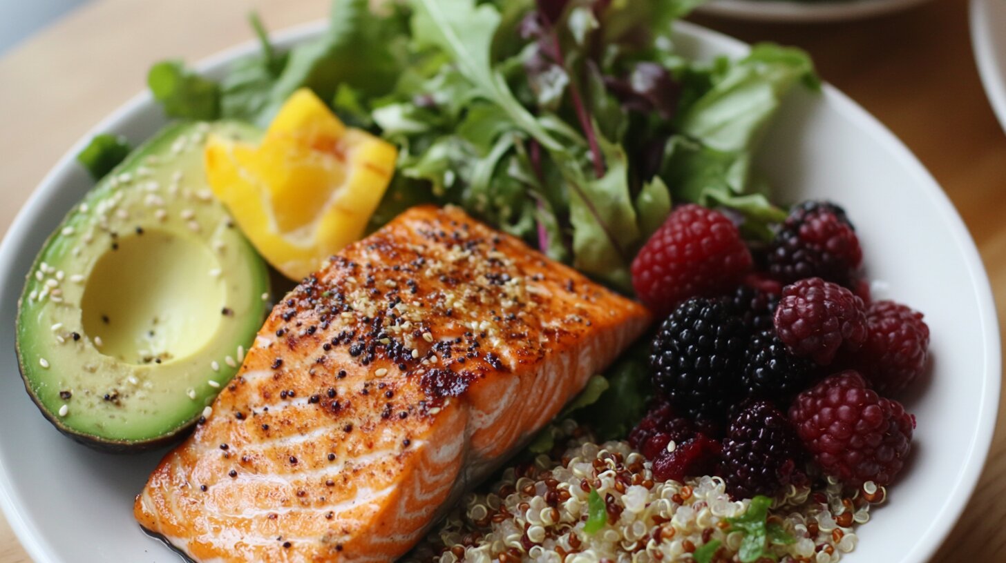 Balanced PCOS-friendly meal plan with salmon, avocado, quinoa, and berries